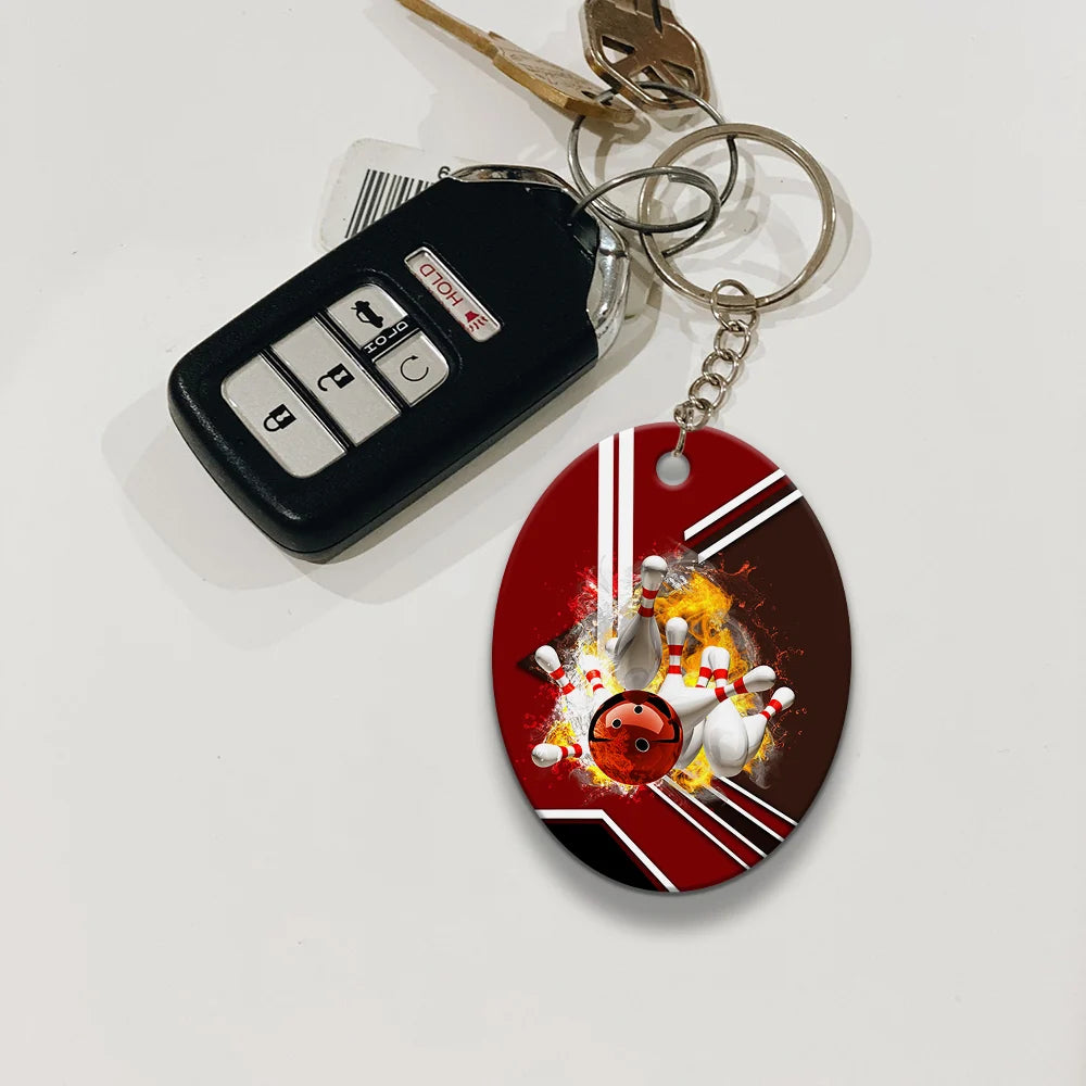Red Bowling Ball On Fire Crashing Pins Keychain ORN0187